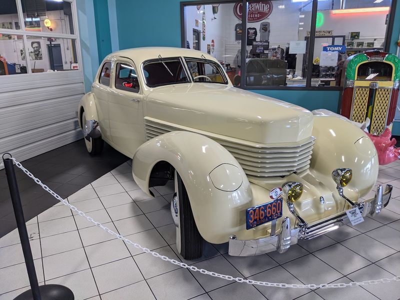 Antique Cars and Motorcycles That Round Out the Collection Beautifully