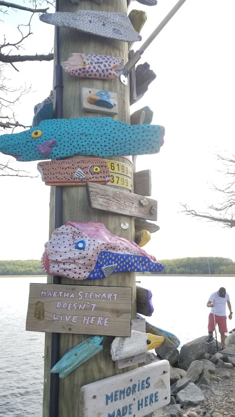 Birdhouses and Driftwood Art Along the Pier Birdhouses and Driftwood Art Along the Pier