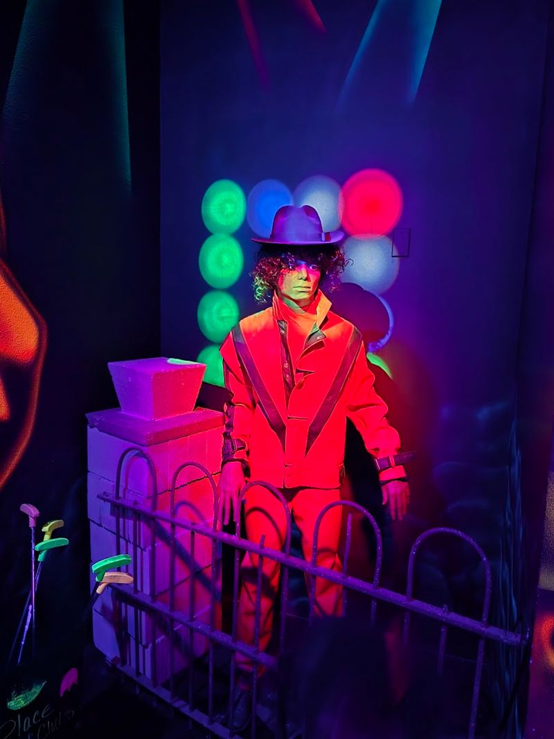 Blacklight Mini Golf With 80s Rock Soundtrack