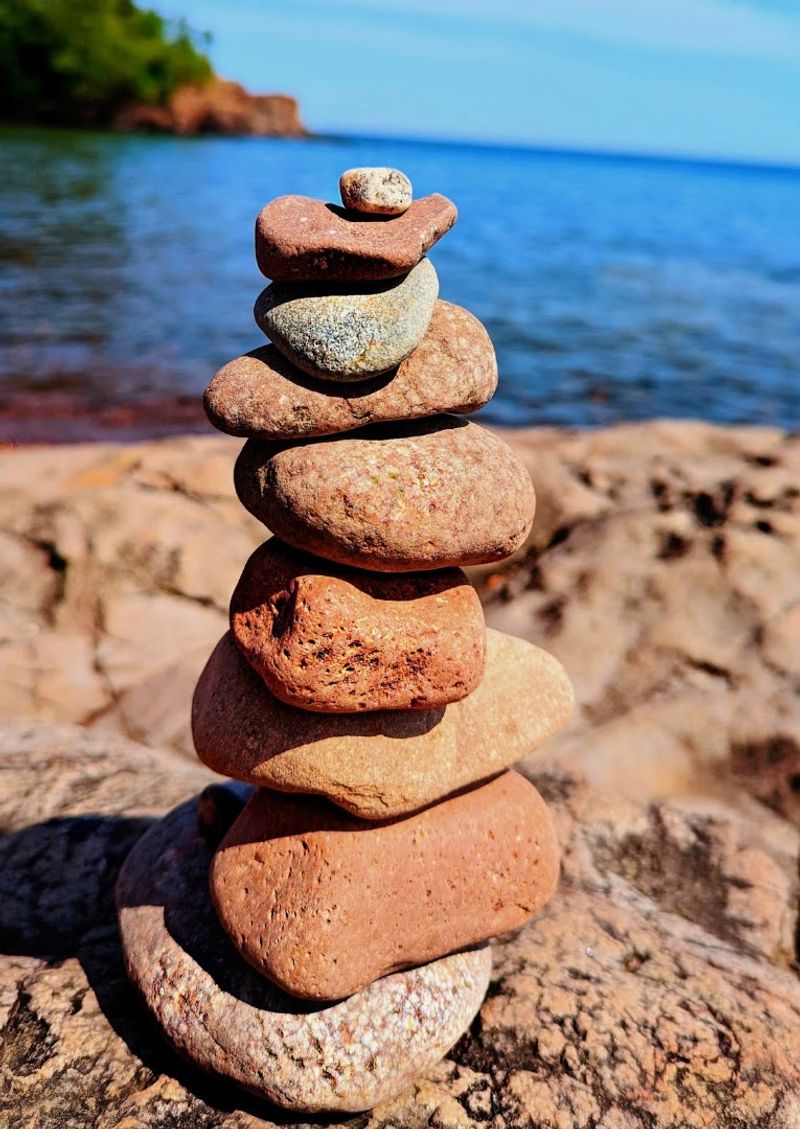 Blue and White Striped Rocks Hidden Among the Pink Ones