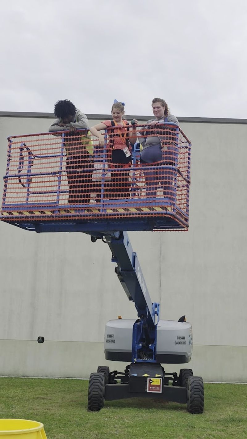 Boom Lift Rides High Above the Ground Boom Lift Rides High Above the Ground