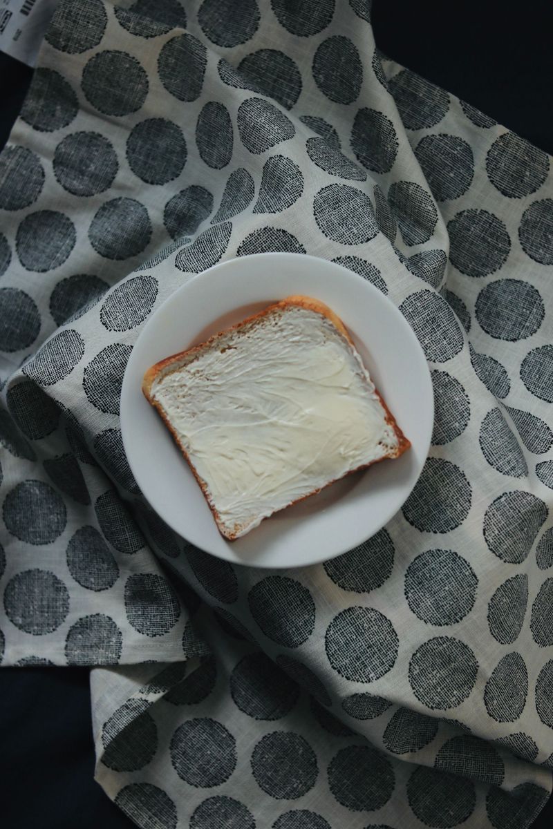 Buttered white bread Buttered white bread