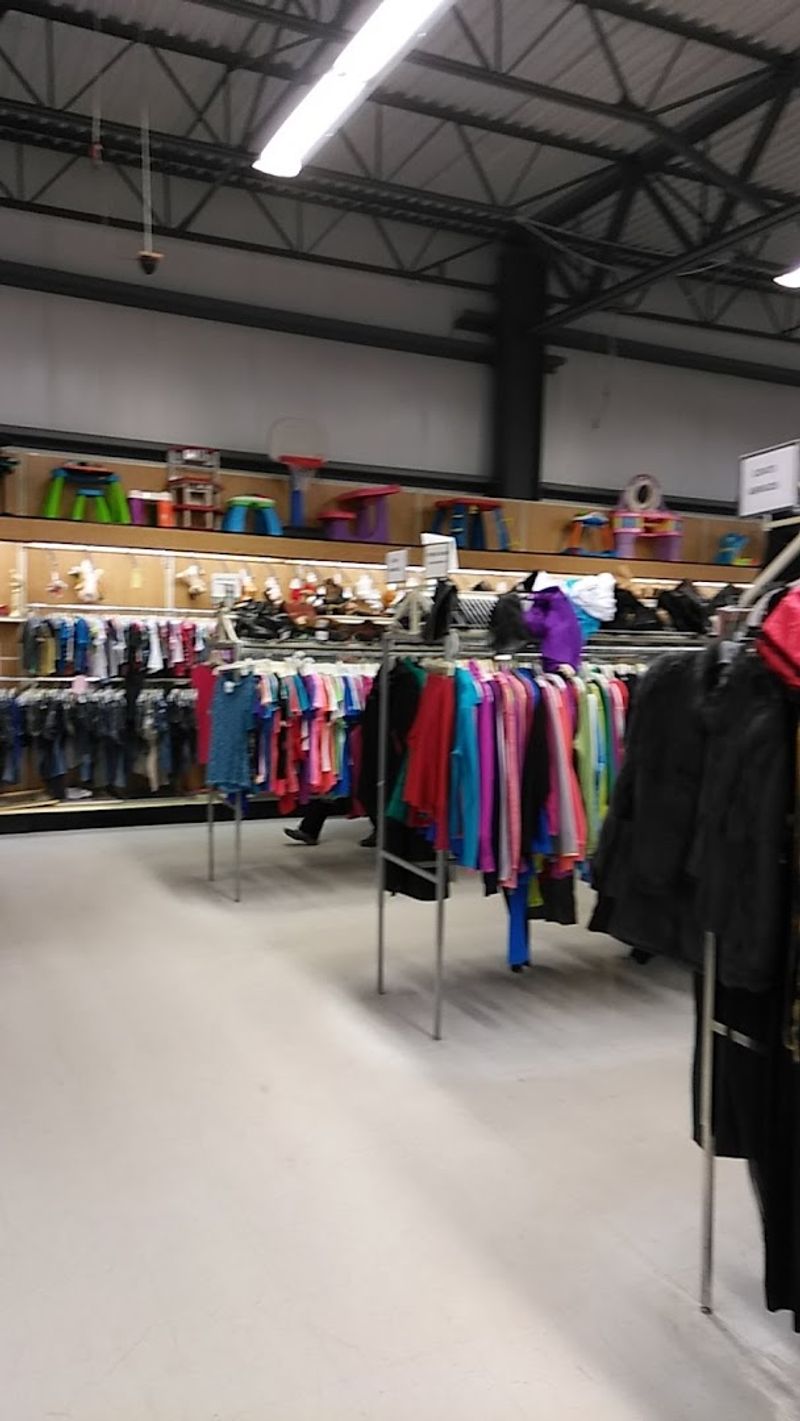 Clothing Racks Are Sorted by Type and Size for Easy Browsing