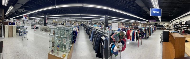 Clothing Racks Packed From Floor to Ceiling Clothing Racks Packed From Floor to Ceiling
