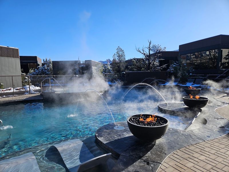 Outdoor Pool, Hot Tub, and Sauna With Koi Pond Views