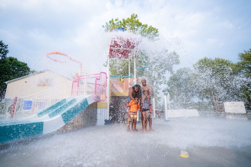 Outdoor Pool with Waterslides and Splash Pad