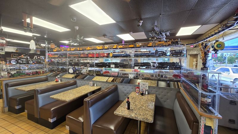 Planes, Trains, And Collectibles Covering Every Inch Of The Walls