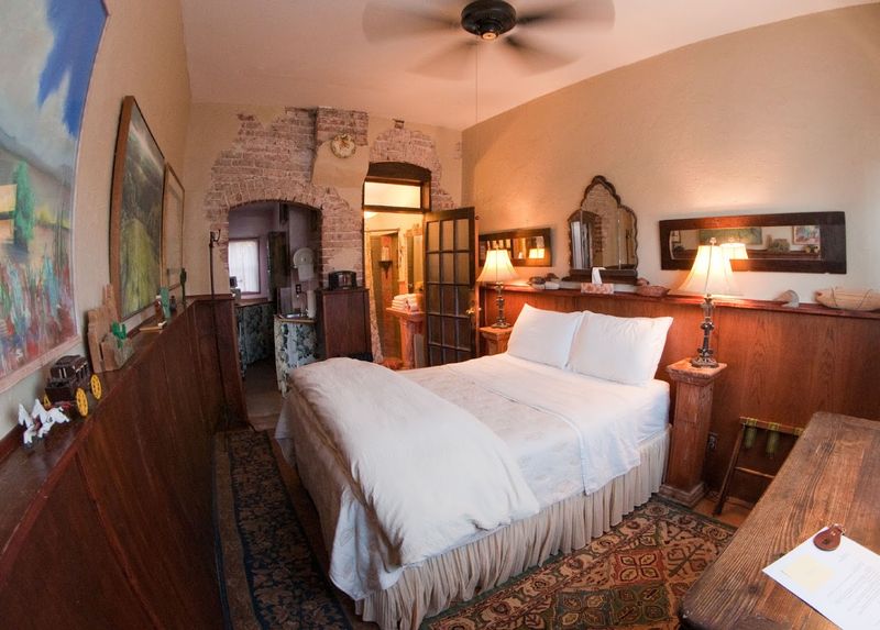 Rooms Decorated With Antiques and Original Artwork