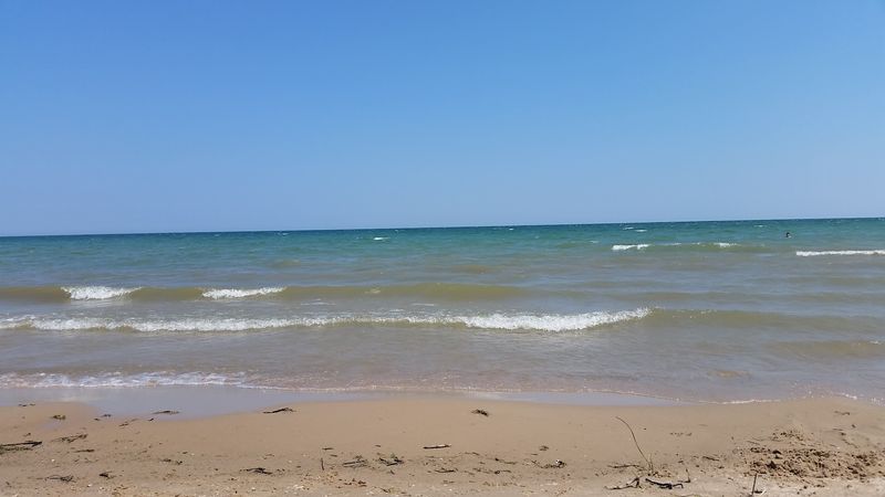 Sandy Warm Waters and Natural Sandbars for Swimming