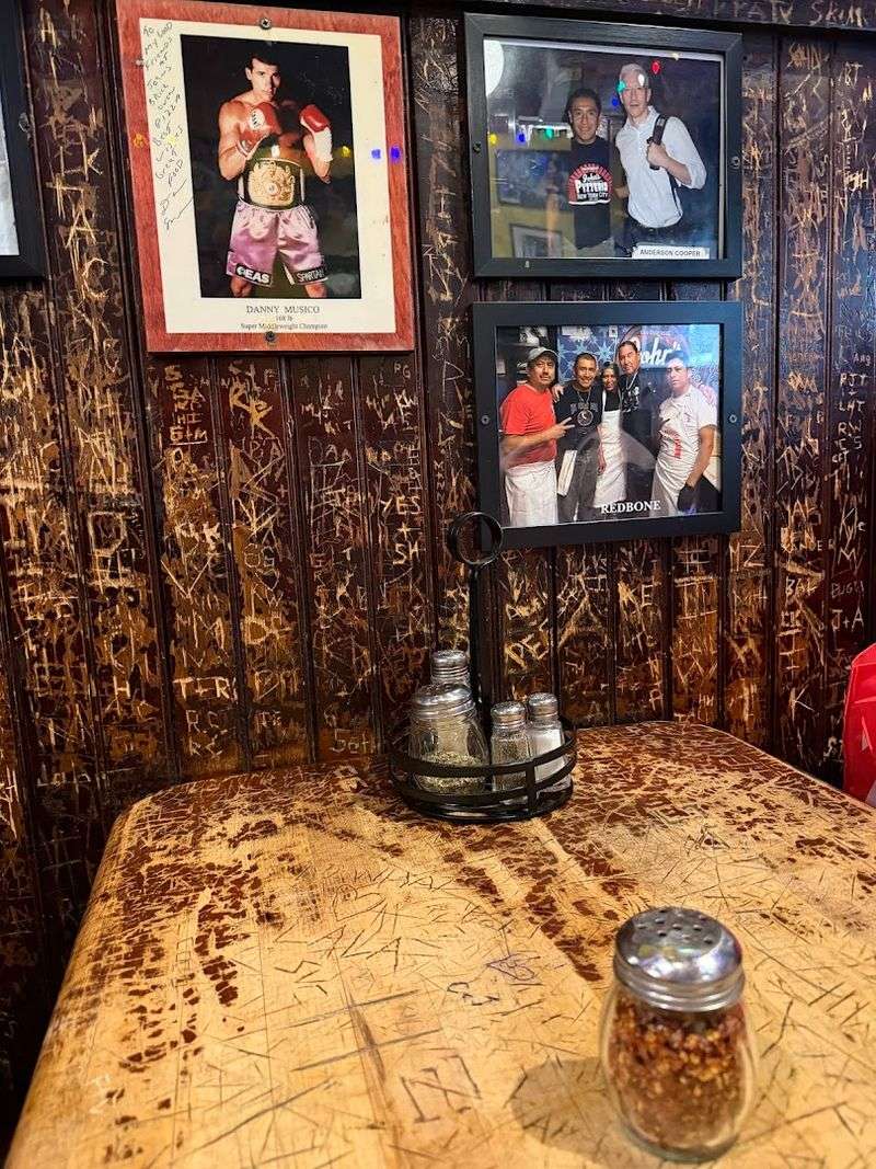 The Booth Graffiti That Tells a Century of Stories