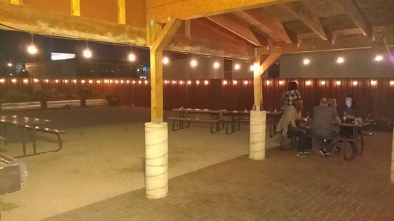 The Covered Patio And Backyard Oasis