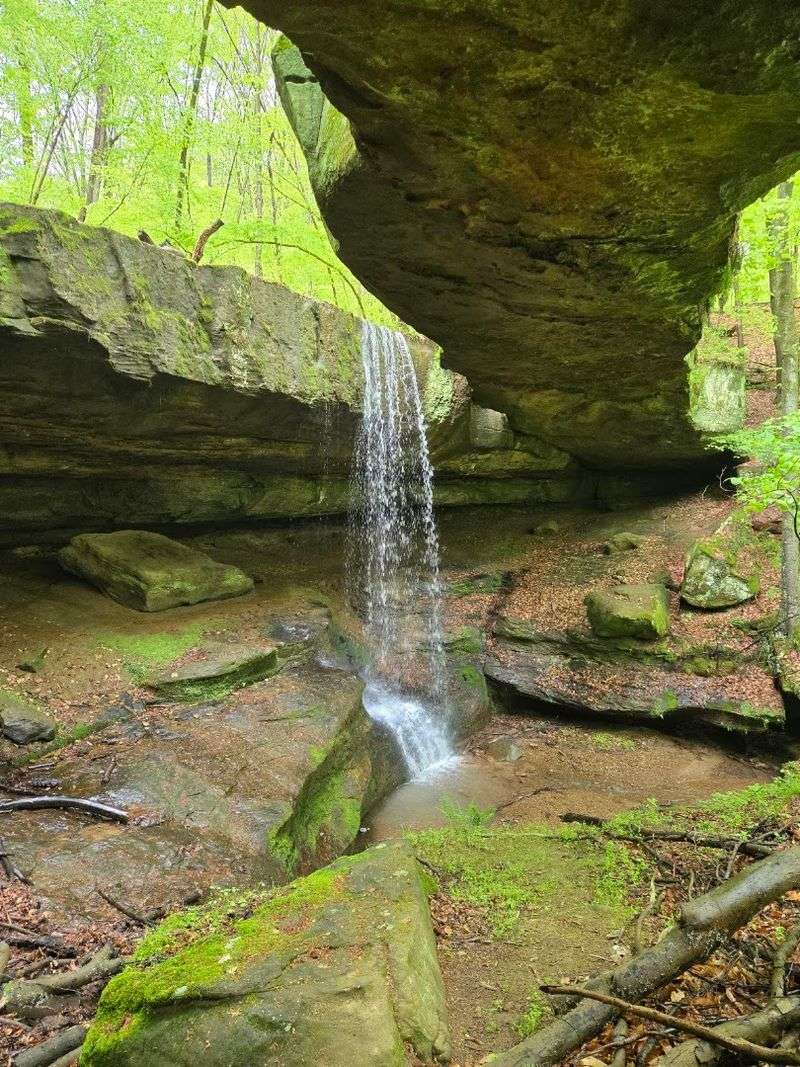 The Hidden Waterfall Tucked Beside the Arch