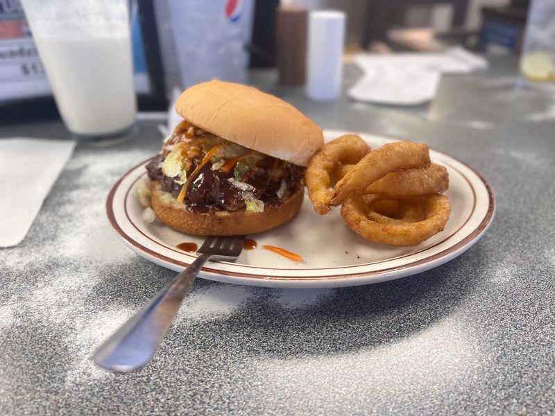 The Triple Cheeseburger With Grilled Onions Is a Must-Try