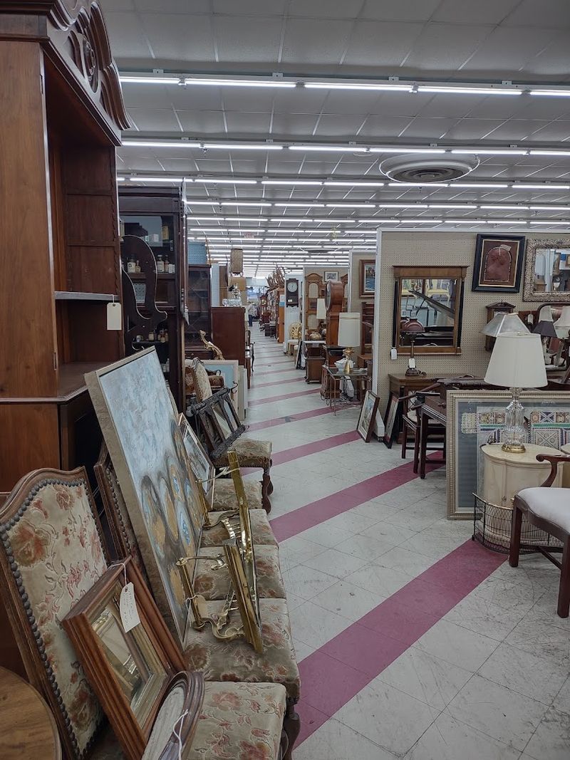 Vintage and Antique Artwork Covering Nearly Every Wall Vintage and Antique Artwork Covering Nearly Every Wall