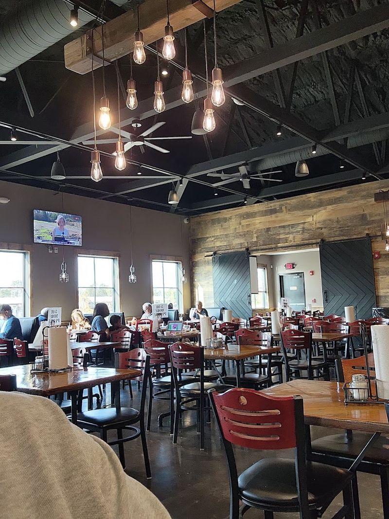 Warm, Spacious Dining Room With a True Southern Atmosphere Warm, Spacious Dining Room With a True Southern Atmosphere