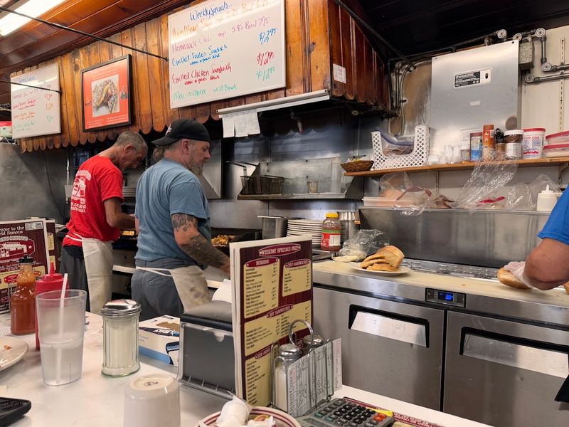Watching the Cook in Action Behind the Counter Watching the Cook in Action Behind the Counter
