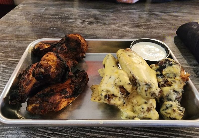 Wings Cooked the Right Way — Over Real Wood Fire