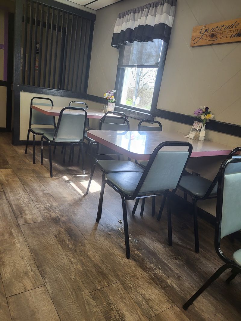 A Clean, Bright Room With a Menu on the Wall A Clean, Bright Room With a Menu on the Wall