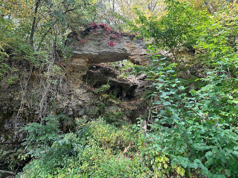 A Natural Rock Arch Near The Water
