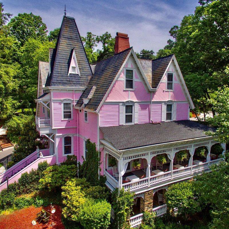 A Pink Mansion on a Hill Near the Biltmore Gates