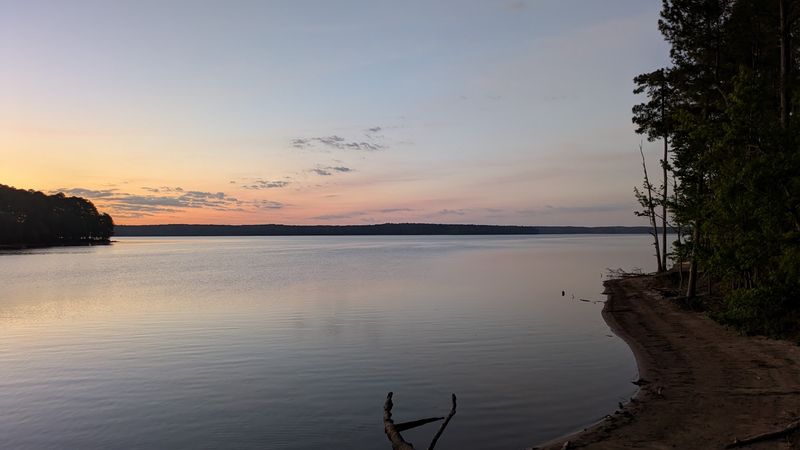 A Reservoir Framed by Forested Hills