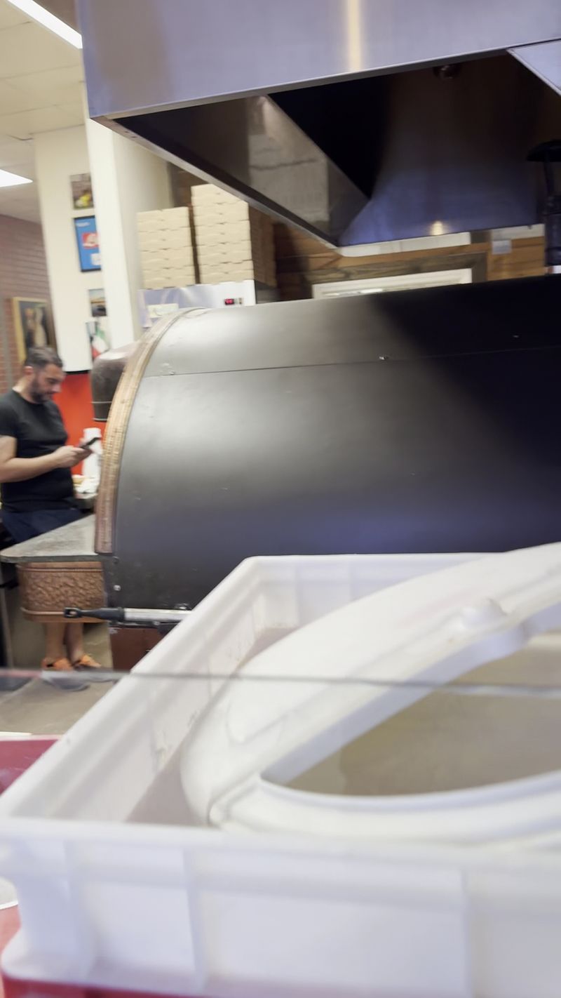 An Italian Hand Behind The Oven