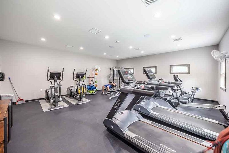 An Onsite Bar, Billiards Room, and Fitness Center An Onsite Bar, Billiards Room, and Fitness Center
