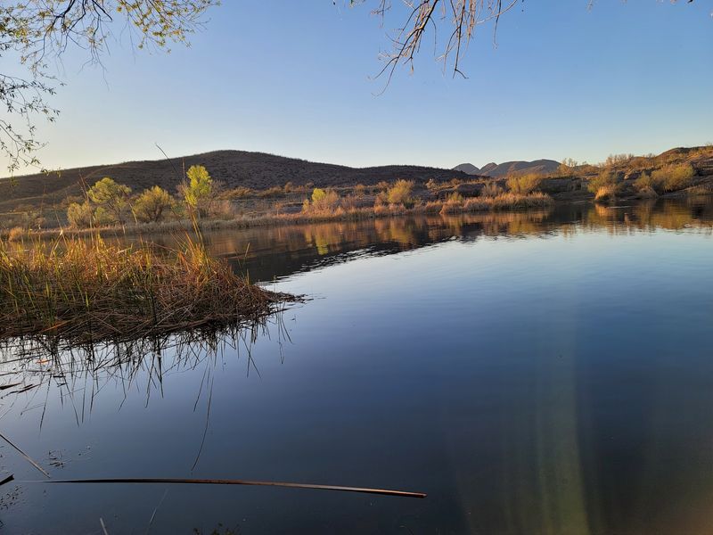 Casting A Line On Calm Water