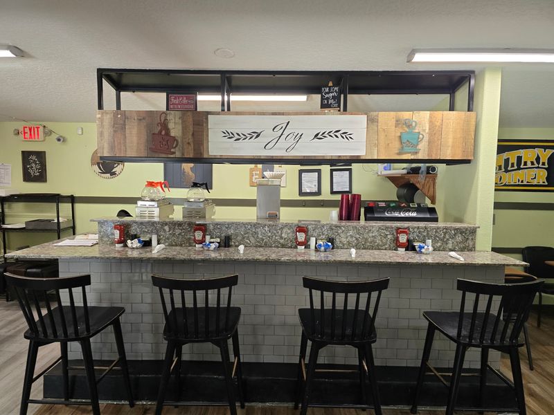 Cheerful Faces Behind The Counter