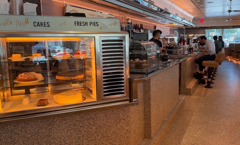 Chrome, Stools, and a Lit-Up Pastry Case