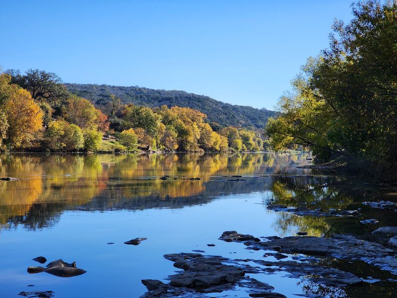 Fishing, Paddling And Casting A Line