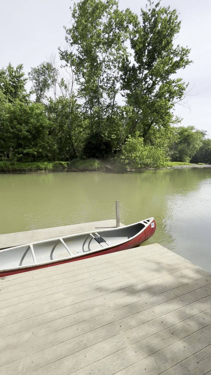 Gliding Across the Water by Canoe Gliding Across the Water by Canoe