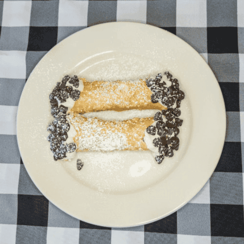 Handmade Cannoli And A Massive Slice Of Cake Handmade Cannoli And A Massive Slice Of Cake