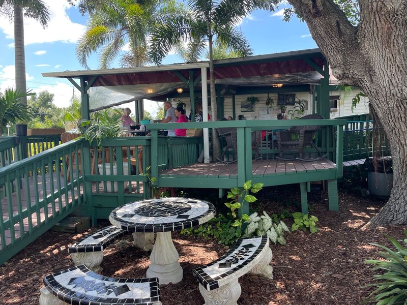 Picnic Tables, Koi Ponds, and Old Florida Charm Picnic Tables, Koi Ponds, and Old Florida Charm
