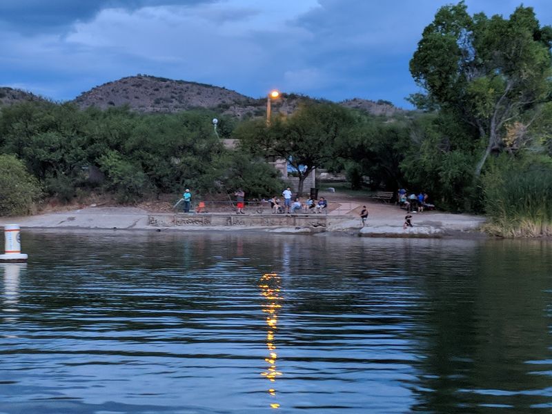 Sandy Shores And A Family Swimming Spot