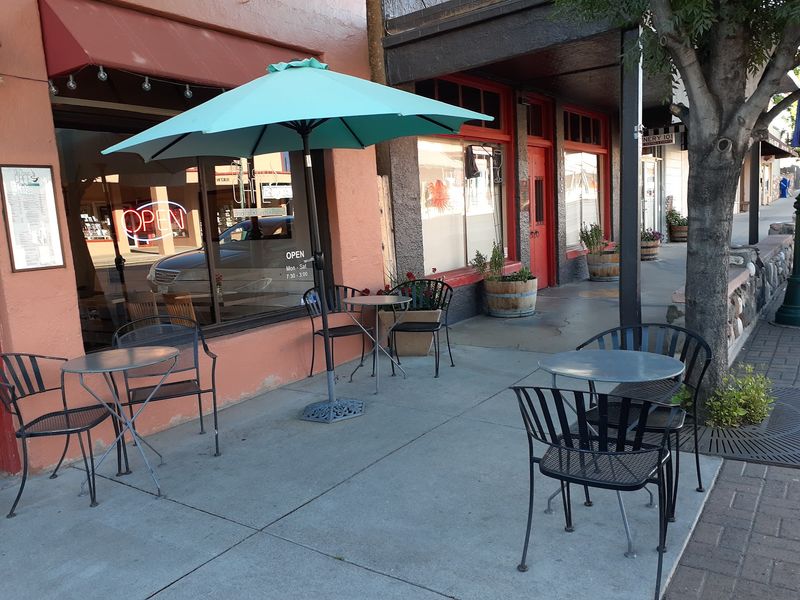Sidewalk Tables And People-Watching