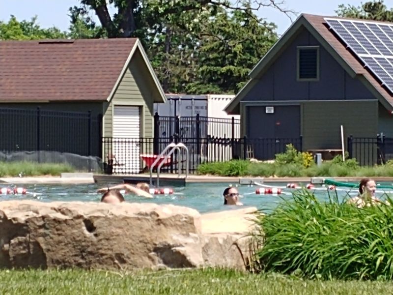 Solar Panels Powering a Greener Community Pool Solar Panels Powering a Greener Community Pool