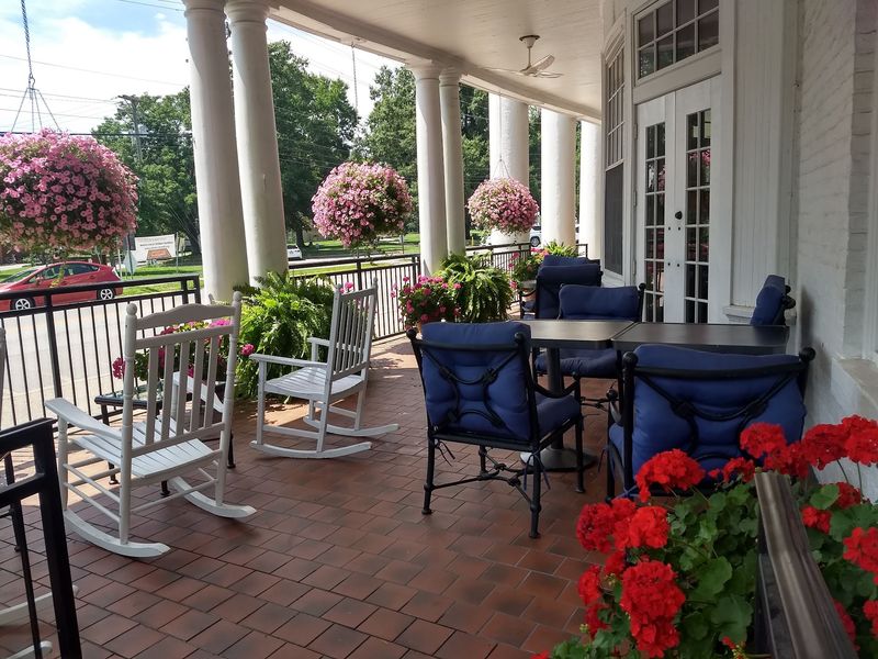 The Front Porch And Its Rocking Chairs