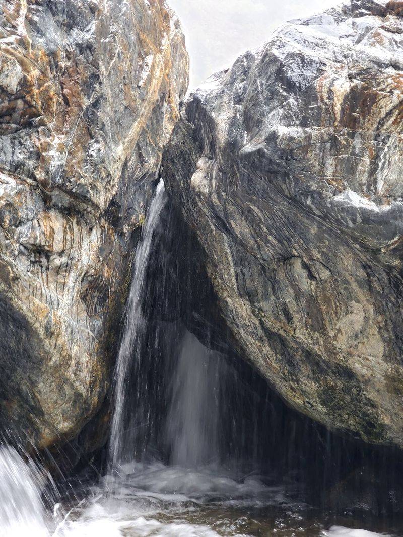 The Hidden Waterfall Above the Rope Ladder