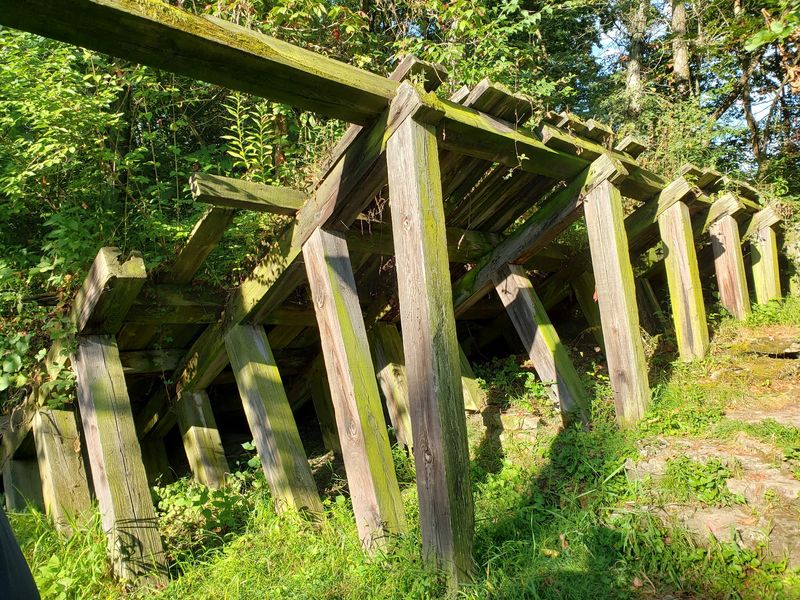 The Old Dam And Wooden Diverter On The Banks