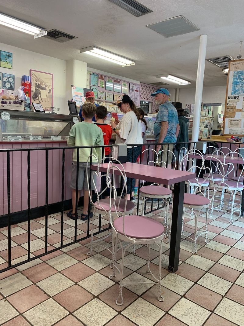 The Owner Behind the Counter The Owner Behind the Counter