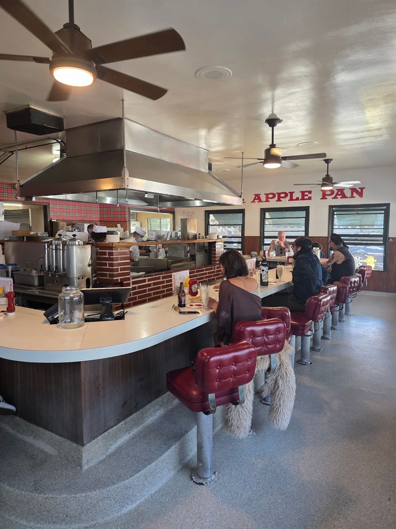 The U-Shaped Counter and Red Stools The U-Shaped Counter and Red Stools