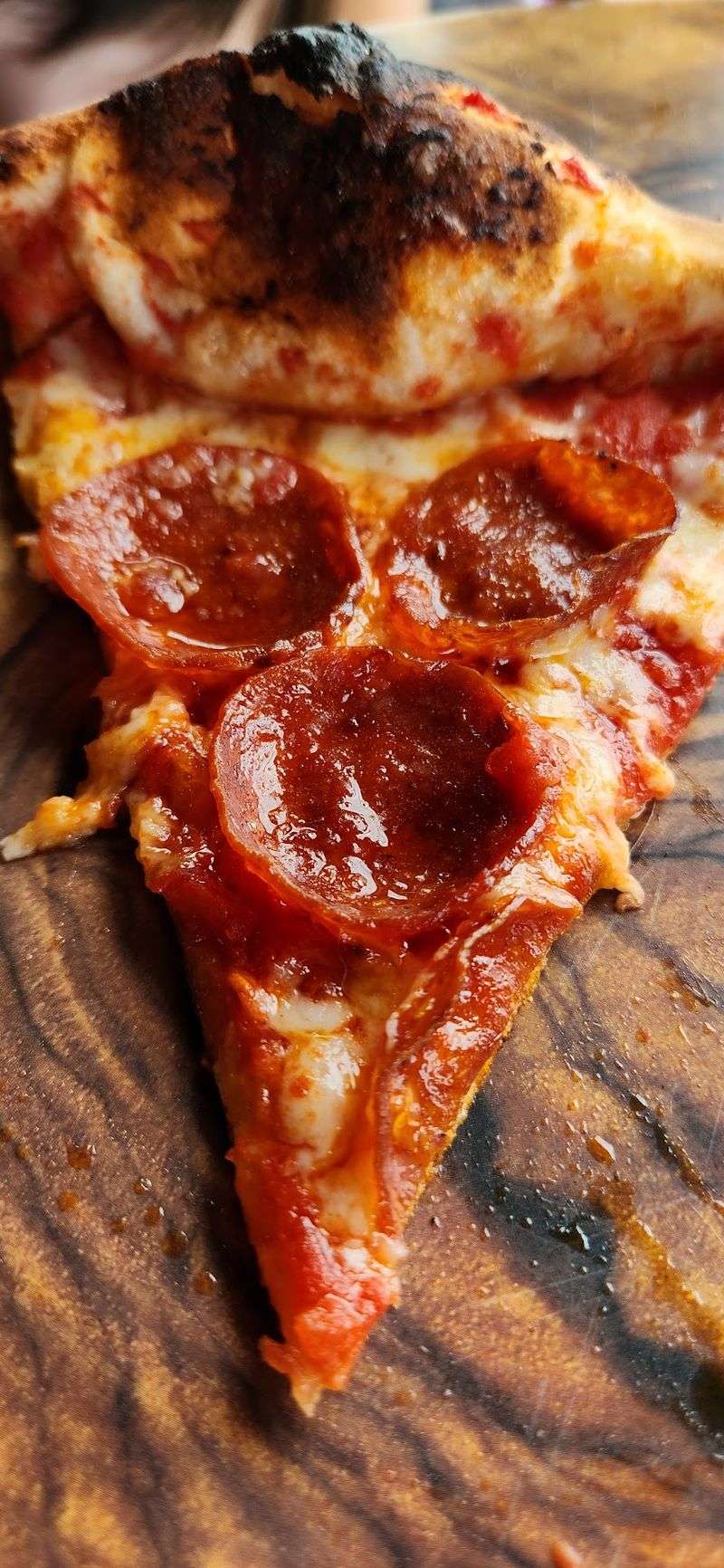 The Wood-Fired Crust That Earns the Miles The Wood-Fired Crust That Earns the Miles