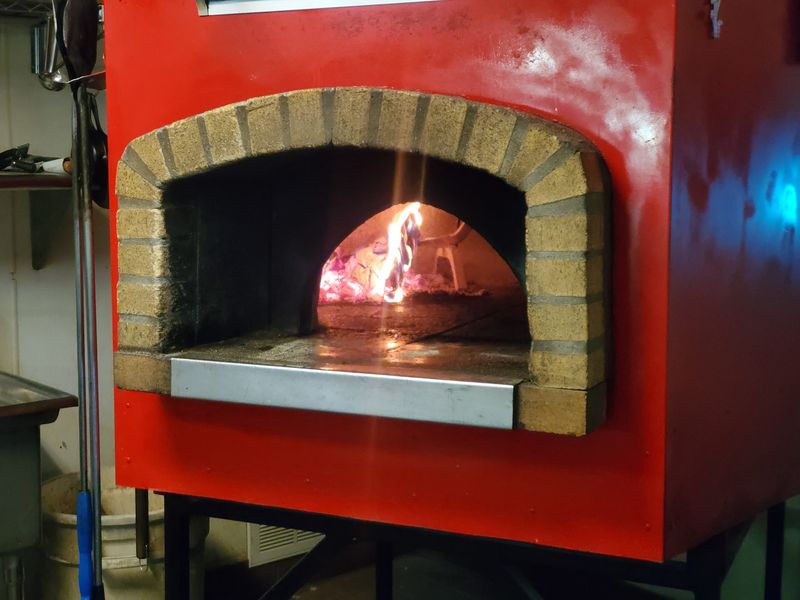 The Wood-Fired Oven That Never Rests The Wood-Fired Oven That Never Rests
