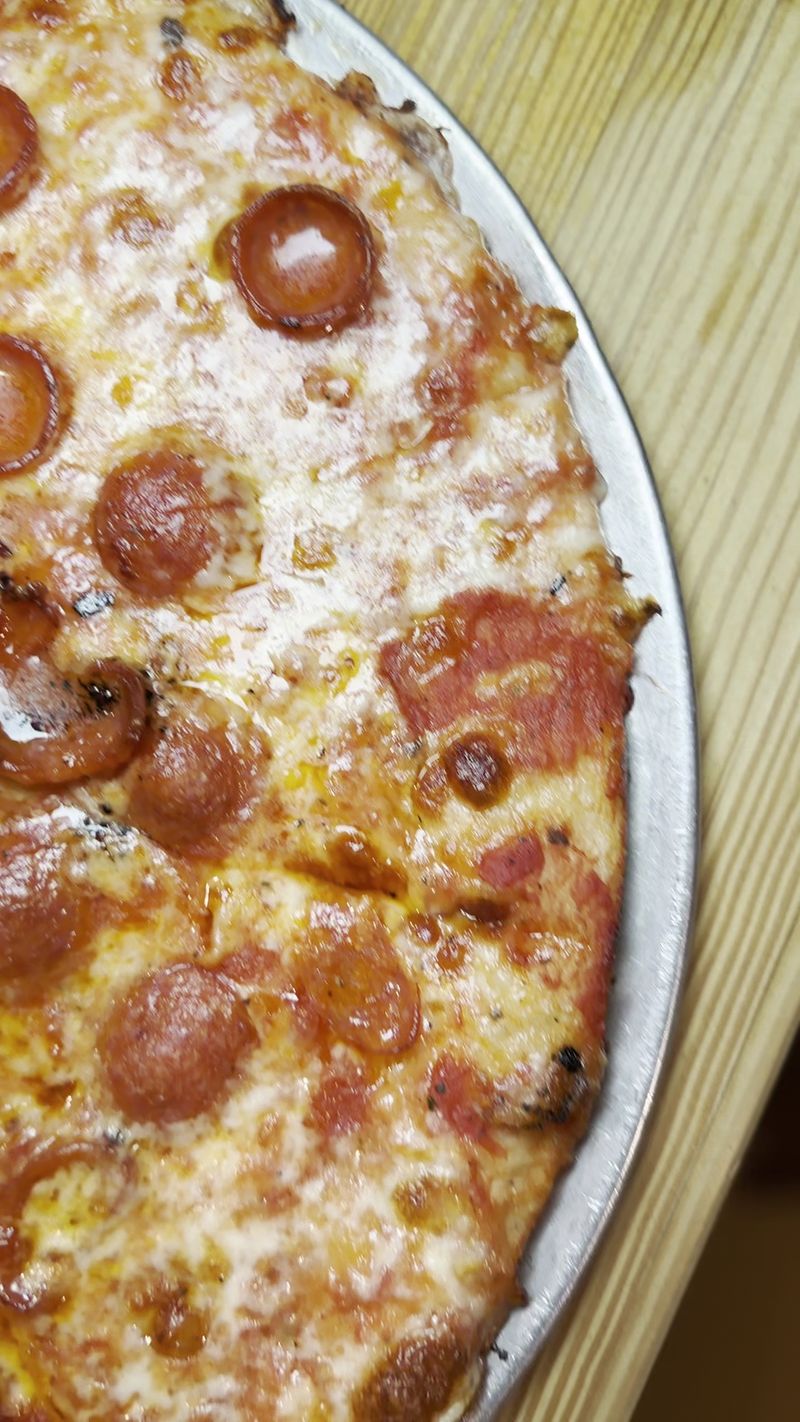 The World-Famous Thin Crust The World-Famous Thin Crust