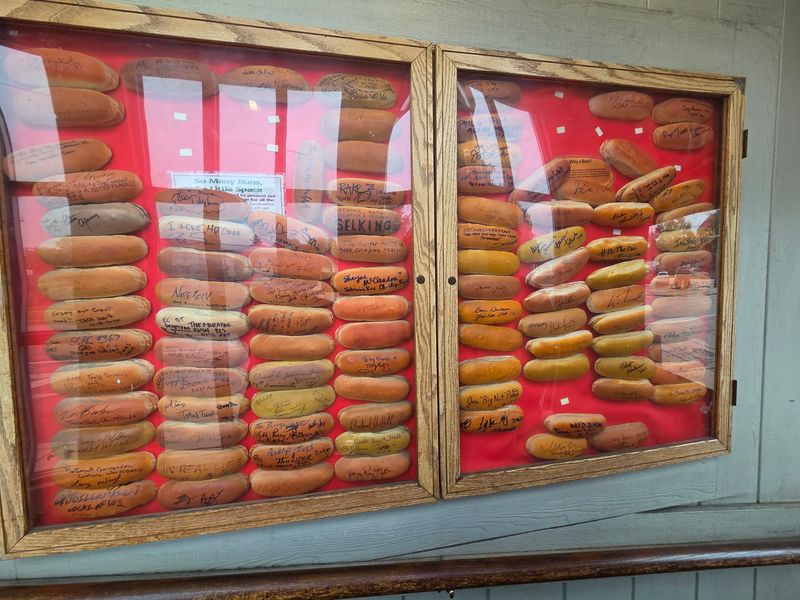 Walls Covered In Signed Hot Dog Buns