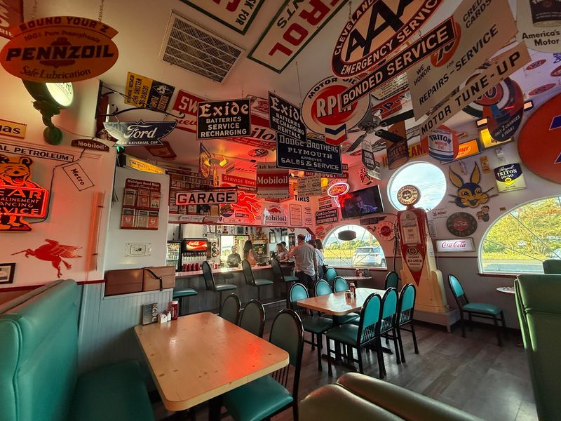 Walls Covered in Vintage Automotive Memorabilia Walls Covered in Vintage Automotive Memorabilia