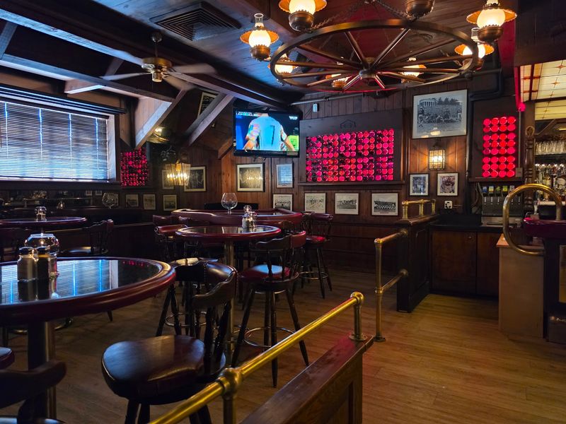 Wood Paneling, Red Leather, And Brass Details Wood Paneling, Red Leather, And Brass Details