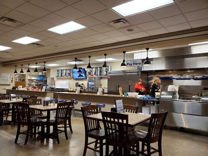 A Busy Lunch Counter With Cozy Chaos