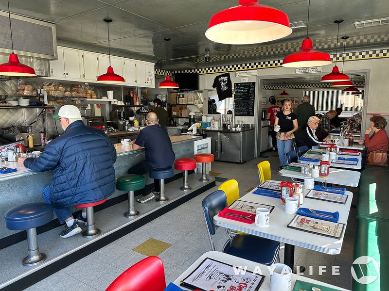 Booths, Tables, And A Counter To Choose From Booths, Tables, And A Counter To Choose From